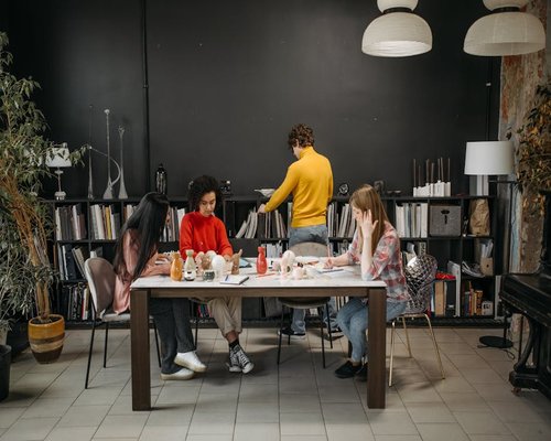 Creative team discussing in a Bogota coworking office